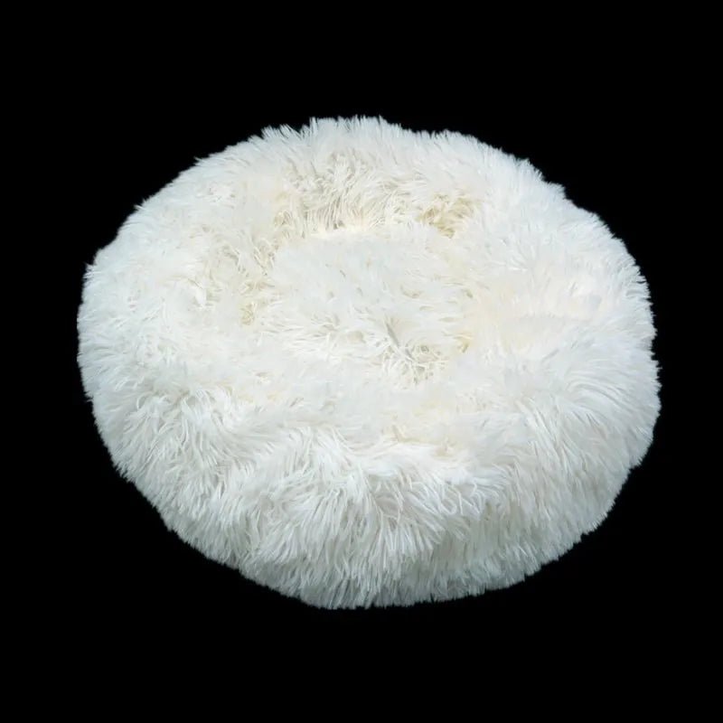 Soft, washable Calming Donut Pet Bed by Mufaal.com for dogs and cats, designed to reduce anxiety with plush, cozy comfort.