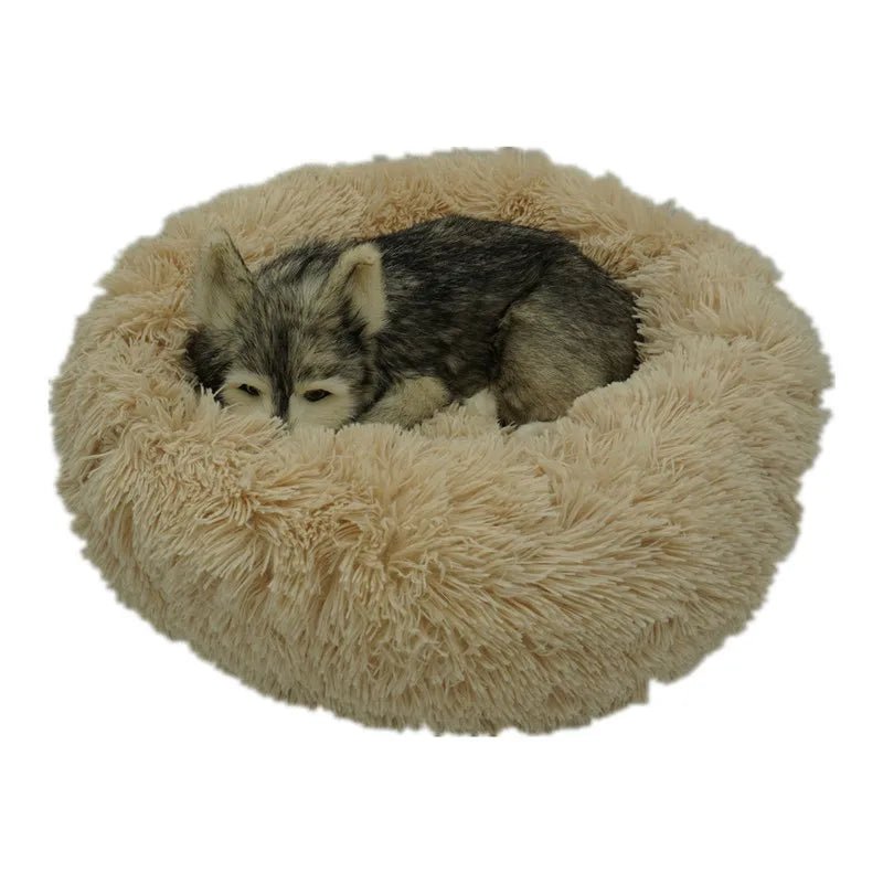 Ultra-soft Mufaal calming donut pet bed for dogs and cats, washable plush bed designed for anti-anxiety comfort