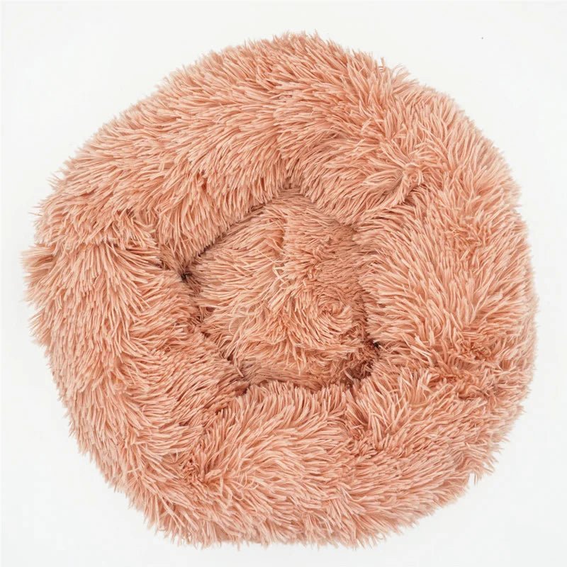 Ultra-soft Calming Donut Pet Bed by Mufaal.com, plush and washable bed designed to reduce anxiety for dogs and cats.