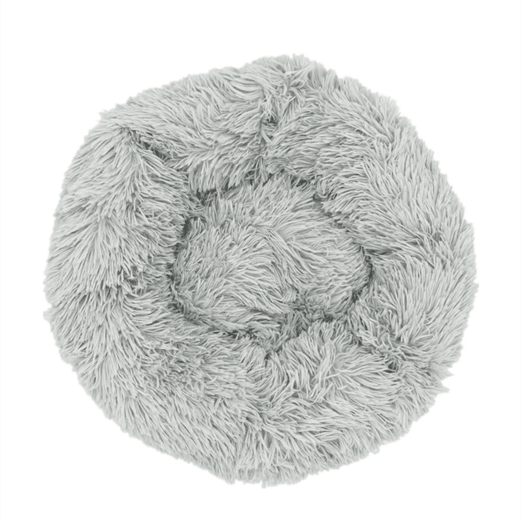 Soft, plush Calming Donut Pet Bed by Mufaal.com for dogs and cats, designed for anti-anxiety comfort and washable convenience.