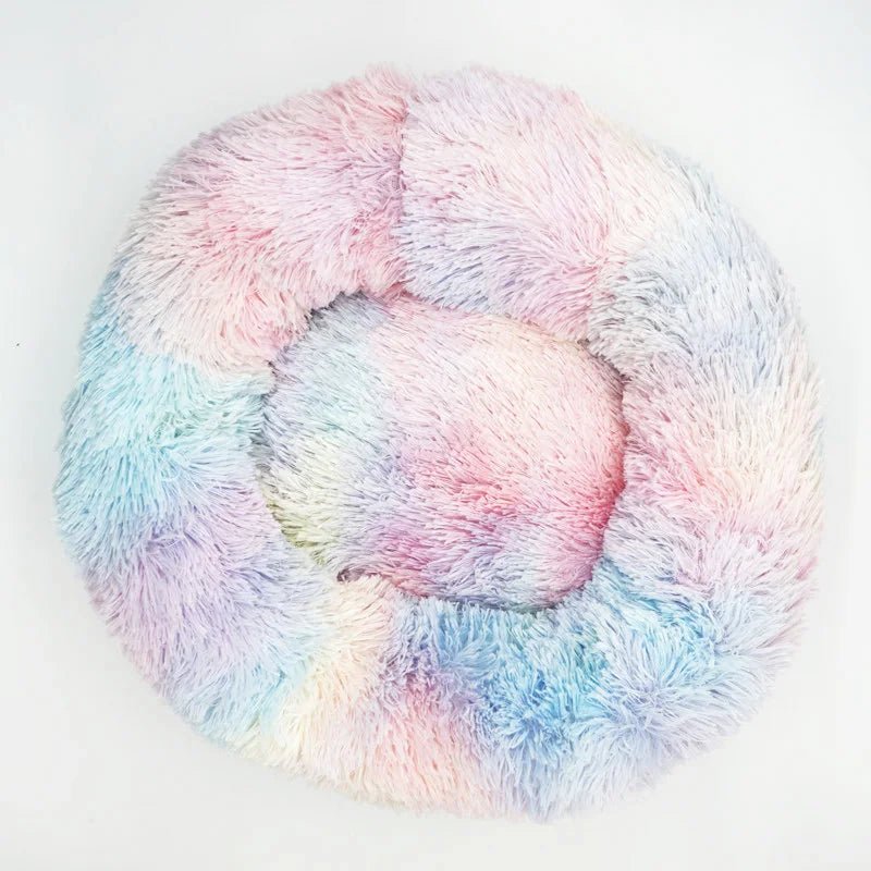 Soft plush calming donut pet bed for dogs and cats, anti-anxiety design, washable and ultra-soft comfort from Mufaal.com
