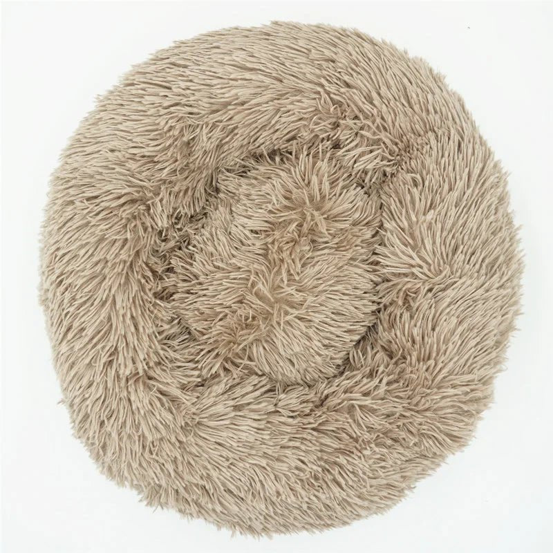 Soft, plush Calming Donut Pet Bed by Mufaal.com designed for dogs and cats, anti-anxiety, washable, and ultra-soft comfort.