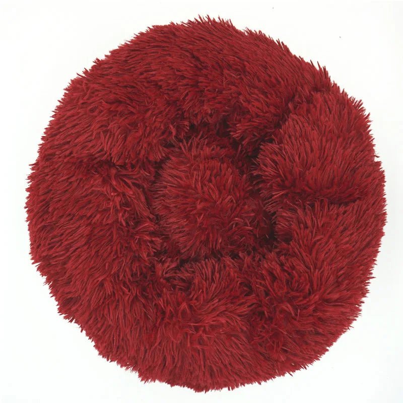 Soft, plush calming donut pet bed for dogs and cats, anti-anxiety design, washable, ultra-soft comfort from Mufaal.com