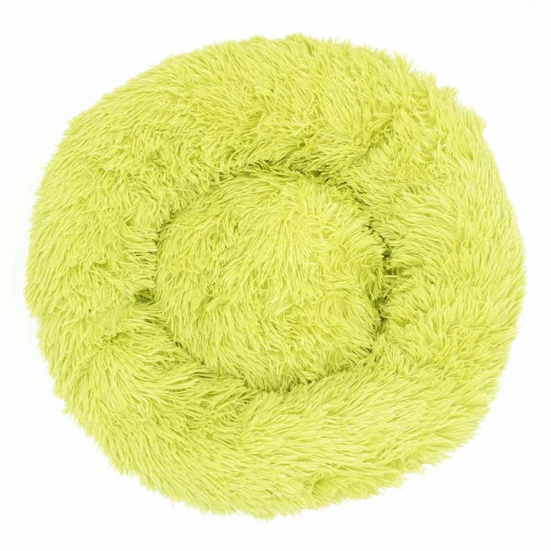 Soft, plush Calming Donut Pet Bed by Mufaal.com for dogs and cats, designed to reduce anxiety and provide cozy comfort.