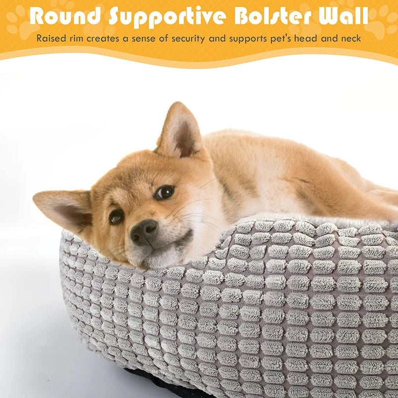 Calming donut pet bed with hood for cats and dogs, ultra-soft, warm, cozy cave bed designed to reduce anxiety and provide comfort.