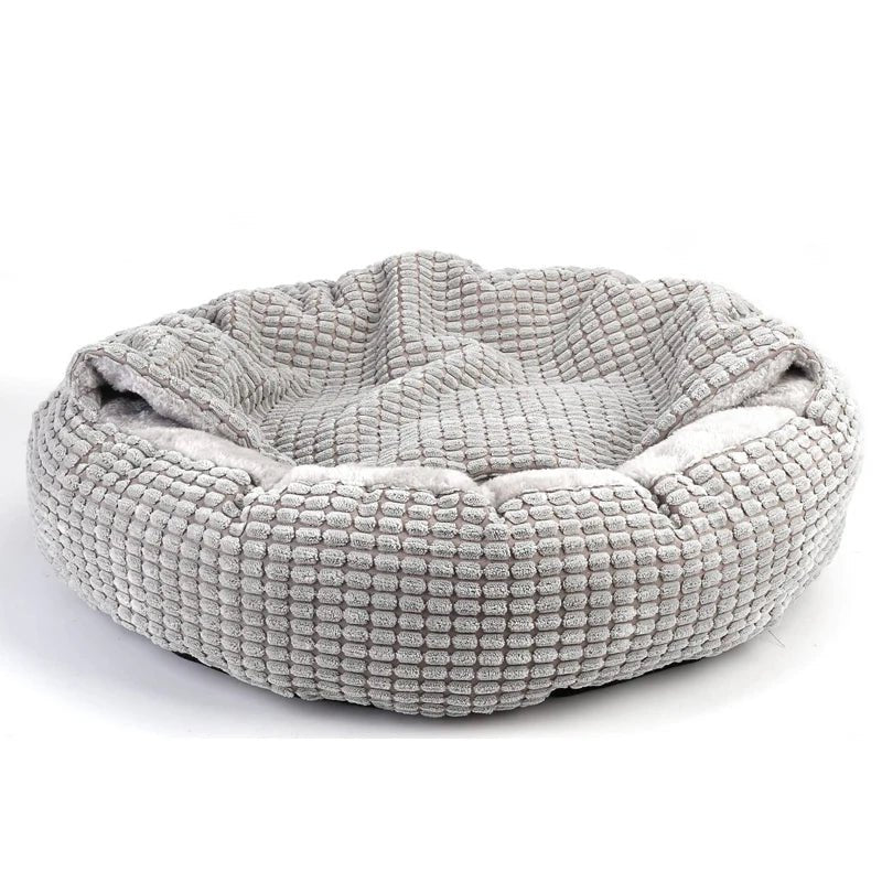 Soft, cozy donut pet bed with hood by Mufaal.com, designed for cats and dogs, provides a warm, anti-anxiety cave resting spot.