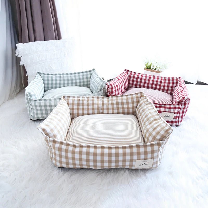 Soft plush raised pet bed from Mufaal.com with head support, ideal for dogs and cats, washable and comfortable.