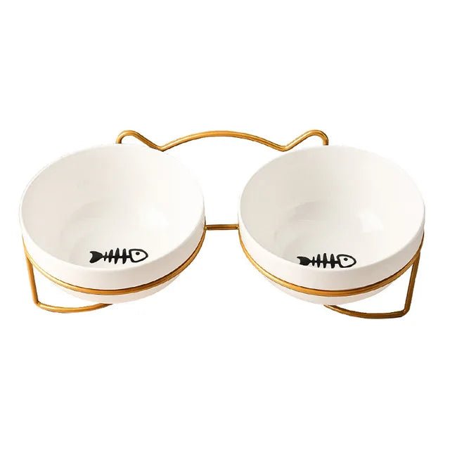 Elevated ceramic pet bowl for cats and small dogs, ergonomic design with anti-spill feature and stylish look.