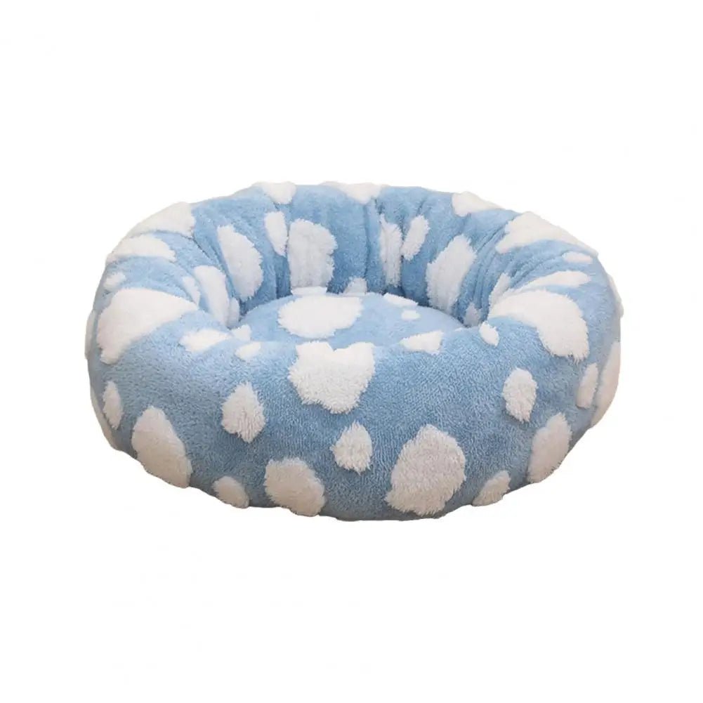 Soft plush pet nest bed with raised edges for dogs and cats, providing comfort and support for restful sleep.
