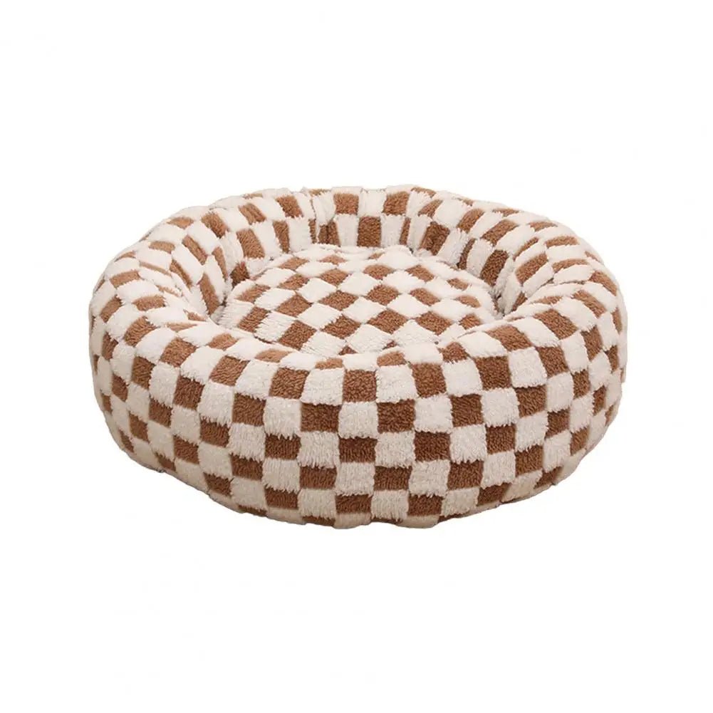 Soft plush pet nest bed with raised edges for dogs and cats, providing comfort and support for cozy sleeping.