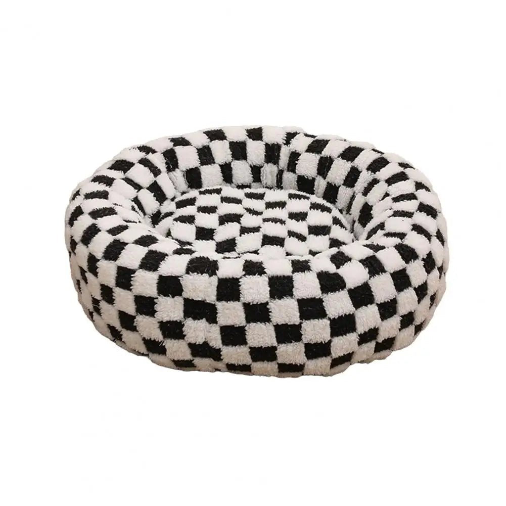 Soft plush pet nest bed with raised edges for dogs and cats, providing comfort and support for restful naps.