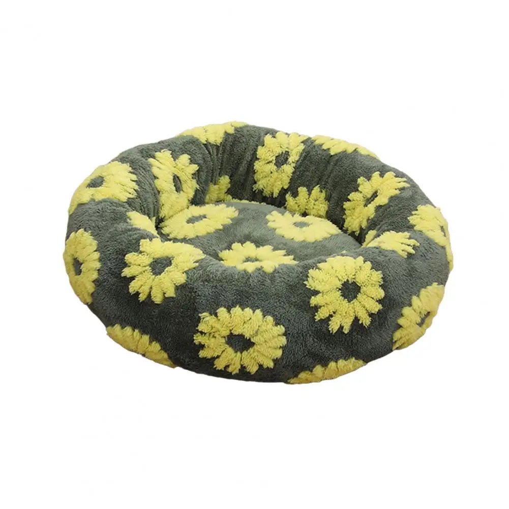 Soft plush pet nest bed with raised edges for dogs and cats, providing comfort and support for restful sleep.