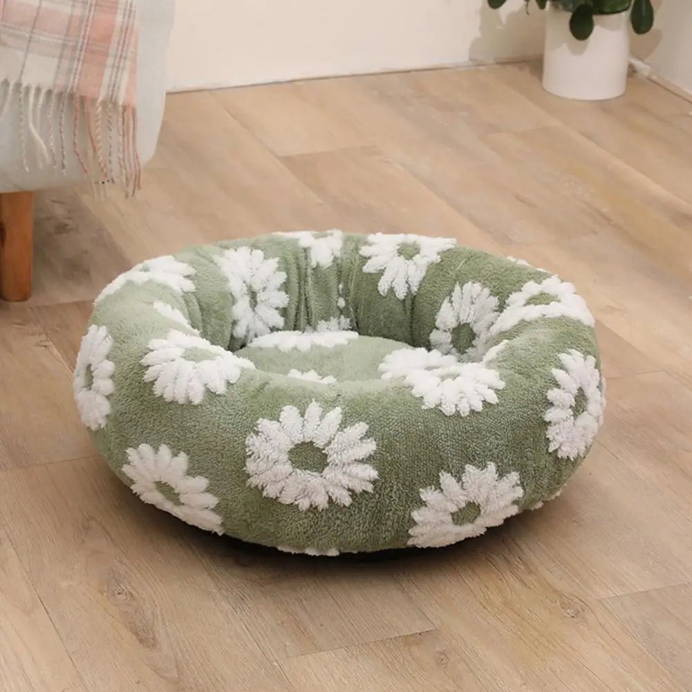 Soft plush pet nest bed with raised edges, ideal for dogs and cats, providing comfort and support.