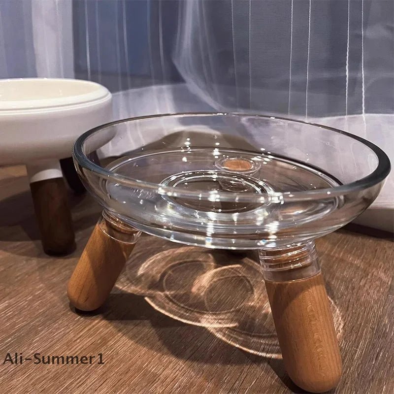 Transparent elevated cat bowl by Mufaal.com, ergonomic anti-spill feeder designed for healthy digestion and easy feeding.