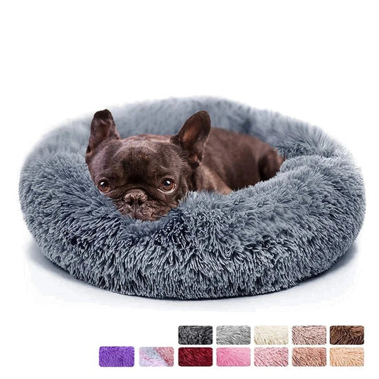 Ultra-soft donut pet bed with plush material and raised edges, ideal for dogs and cats seeking cozy, calming comfort.