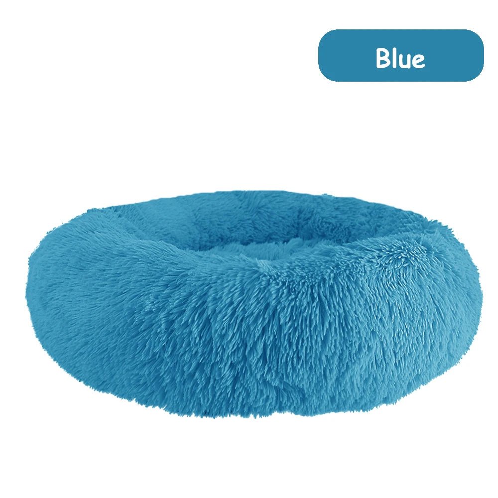 Ultra soft donut pet bed by Mufaal.com with plush fabric and raised edges, ideal for dogs and cats' comfort and calming rest.