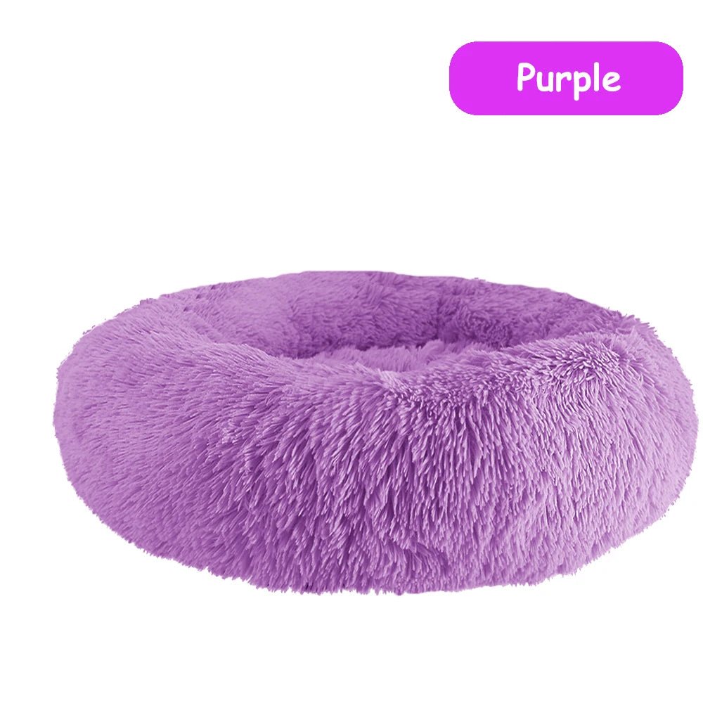 Ultra soft donut pet bed by Mufaal.com with plush material and raised edges, ideal for dogs and cats to rest comfortably.