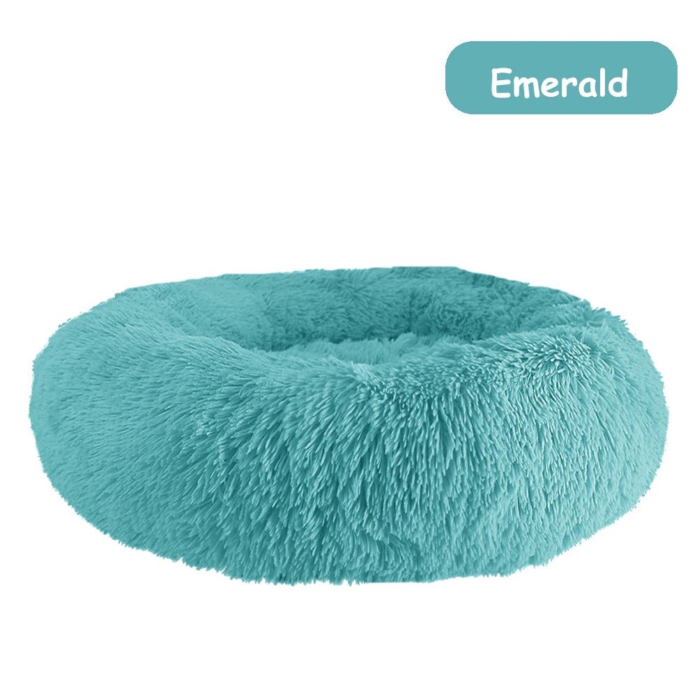 Ultra-soft donut pet bed by Mufaal.com with plush material and raised edges, ideal for dogs and cats seeking comfort and calm.