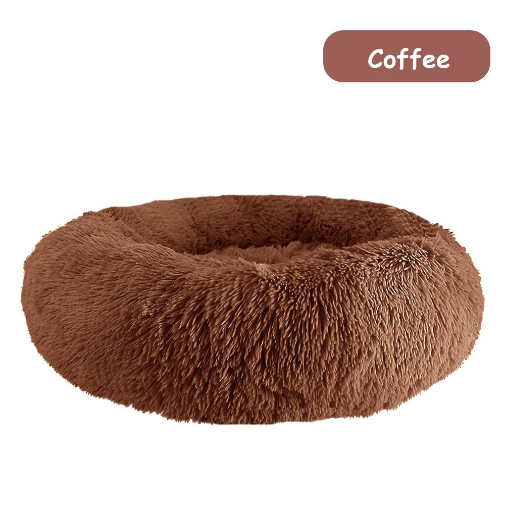 Ultra soft donut pet bed by Mufaal.com with plush fabric and raised edges, ideal for dogs and cats seeking comfort and security.